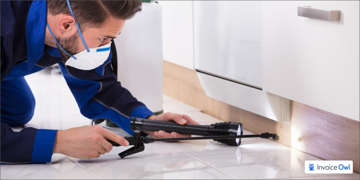 Pest control technician receiving hands-on training in the field